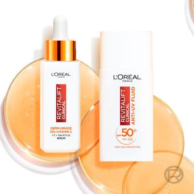 L&#039;Oréal Paris Revitalift Clinical Pure 12% Vitamin C Pacco regalo siero Revitalift Clinical Vitamin C Serum 30 ml + crema quotidiana per la pelle Revitalift Clinical Vitamin C Anti-UV Fluid SPF50 50 ml