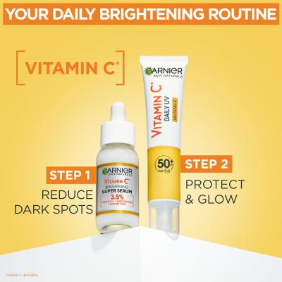 Garnier Skin Naturals Vitamin C Pacco regalo siero per il giorno per il viso Skin Naturals Vitamin C Brightening Super Serum 30 ml + fluido giorno per il viso Skin Naturals Vitamin C Daily UV Invisible SPF50 40 ml